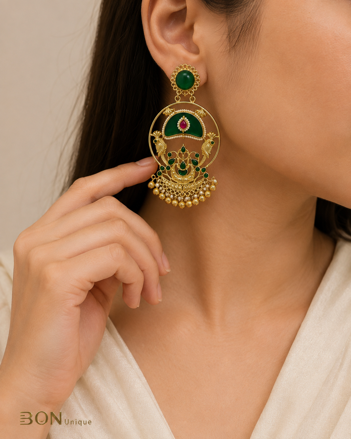 Emerald Peacock Chandbali Earrings pair flat lay