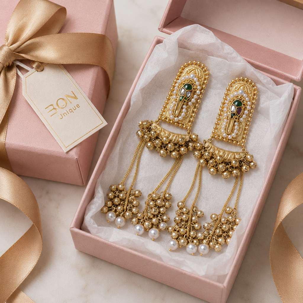 Model wearing Gold Arch Ghungroo Drop Earrings