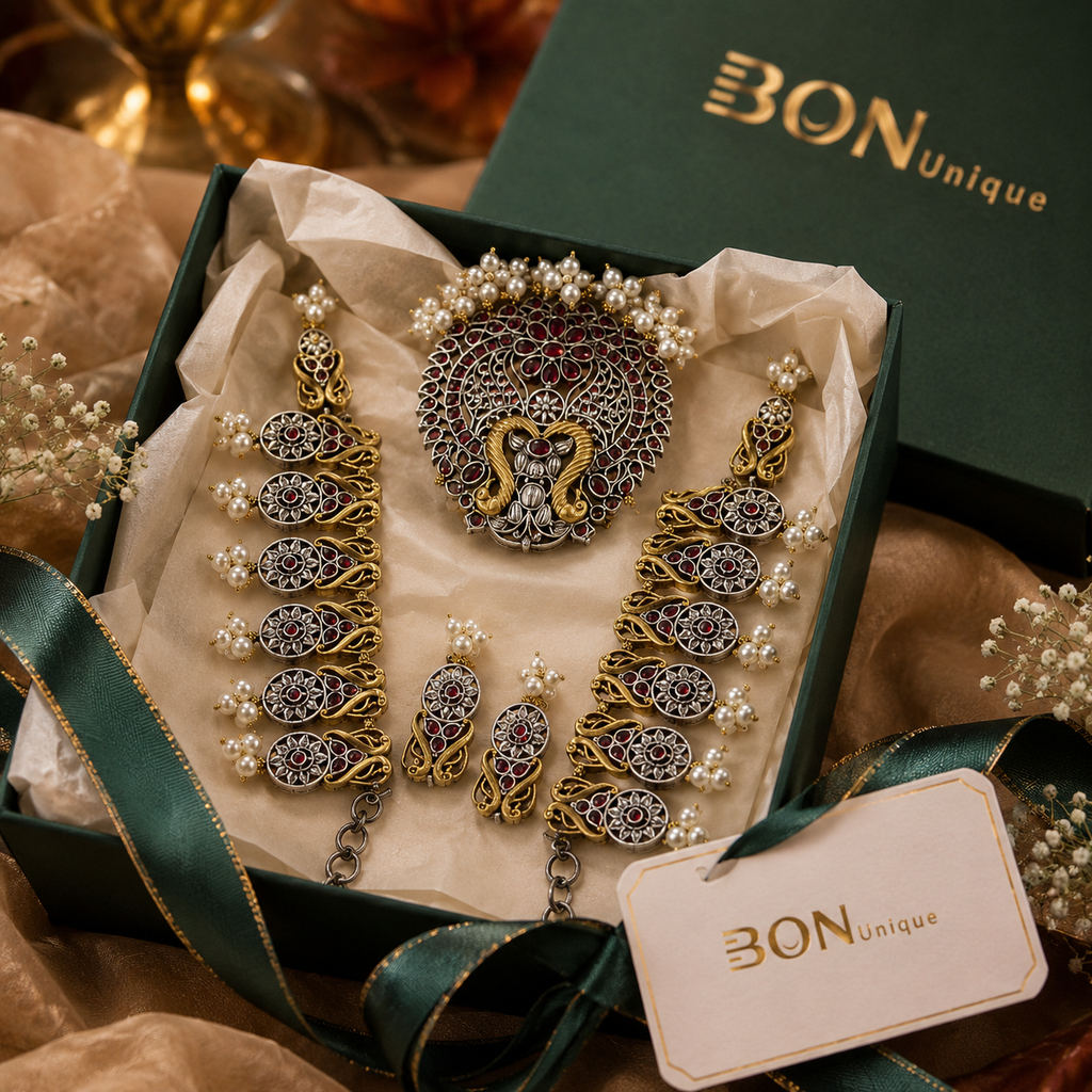 Dual-tone peacock necklace set with ruby stones and earrings in BON Unique signature gift box