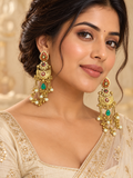 Traditional pearl earrings worn with ethnic attire